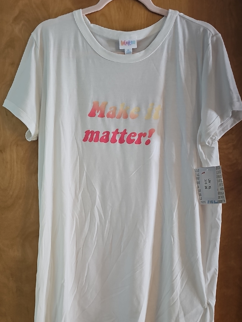 LuLaRoe White Tee with Multicolor Logo